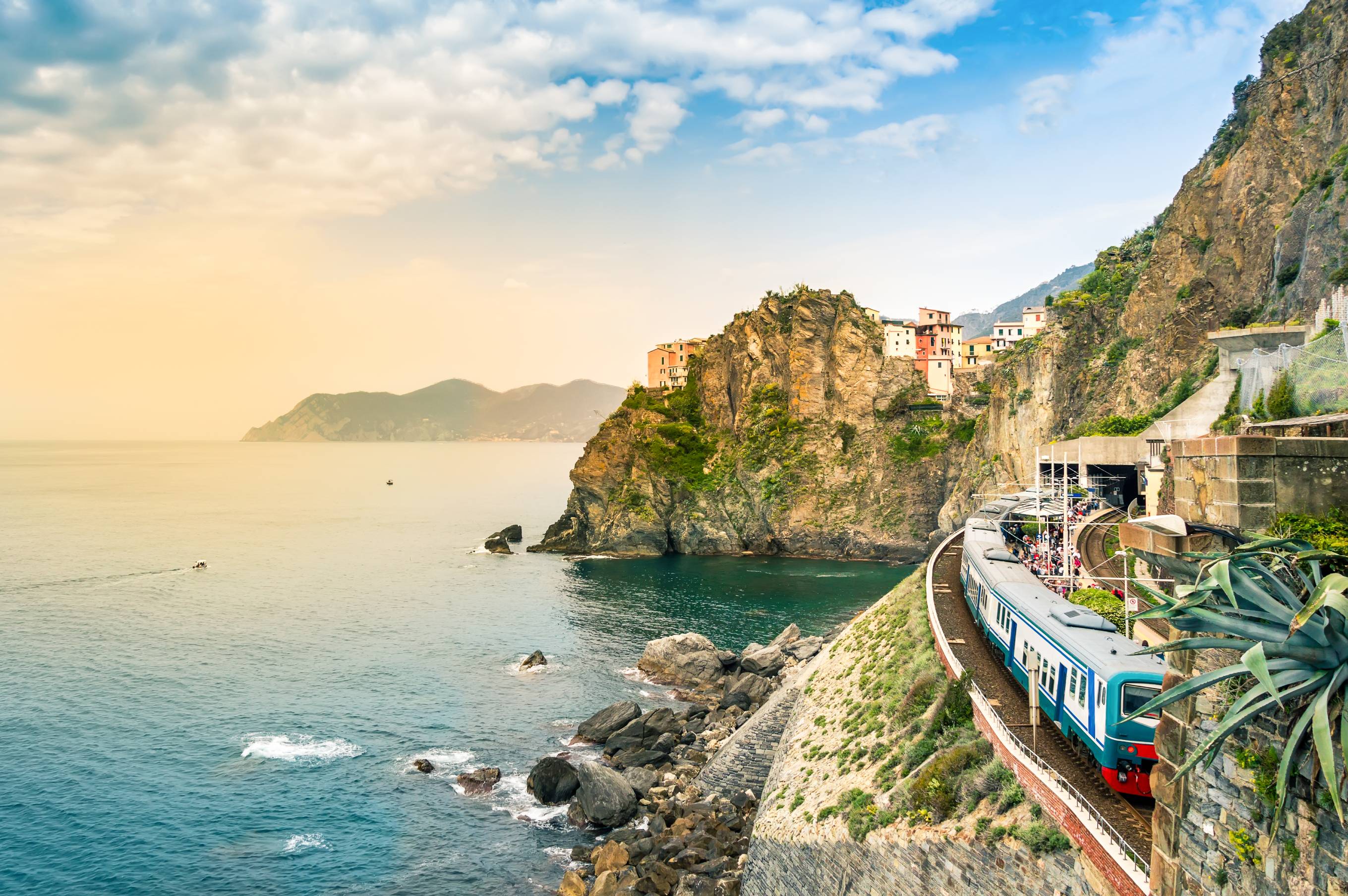 Manarola, Cinque Terre - train station in famous village with colorful houses on cliff over sea in Cinque Terre.