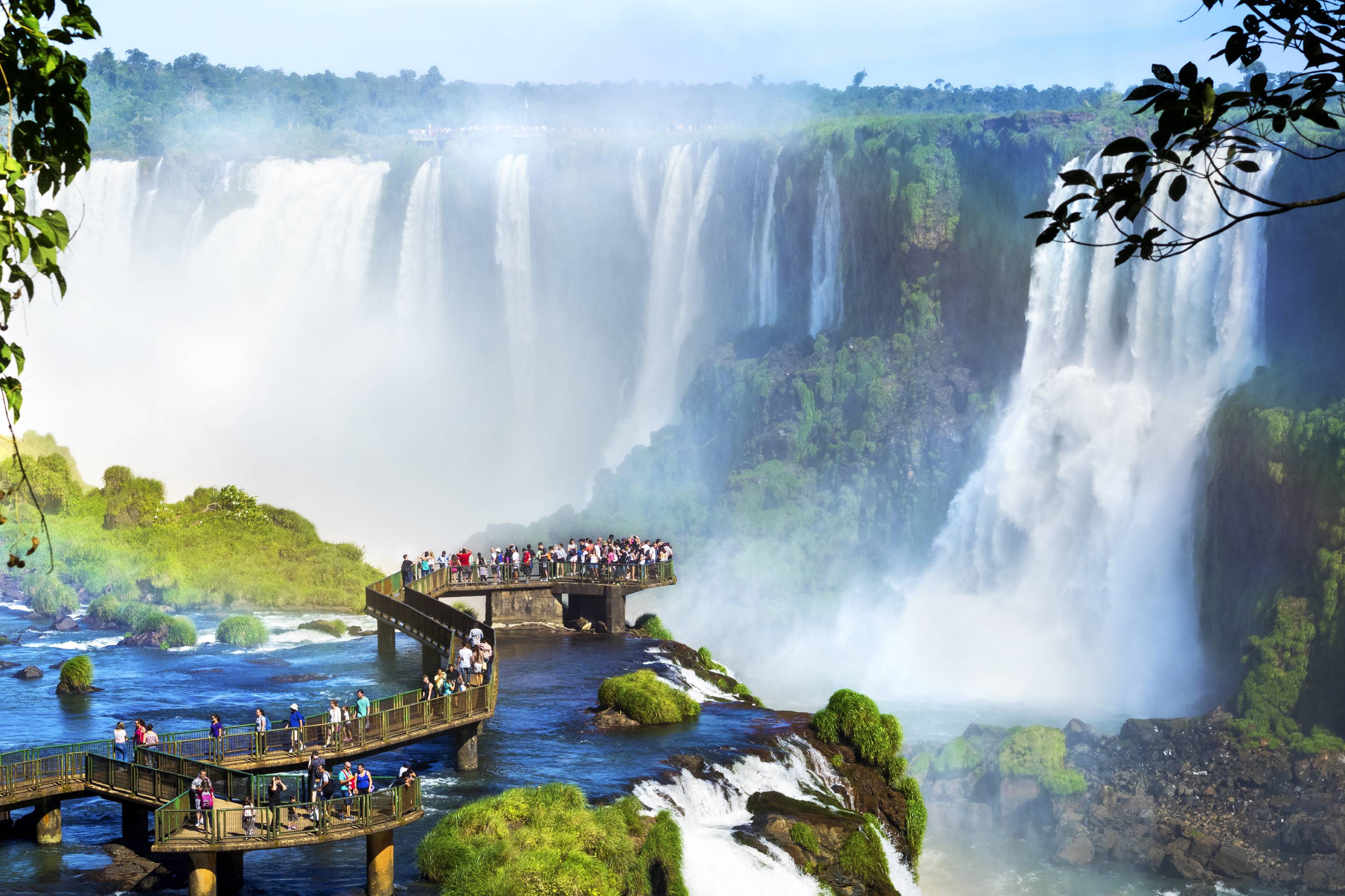 Tourists at Iguazu Falls, one of the world's great natural wonders, on the border of Brazil and Argentina.